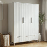 [White] Flutrina three door wardrobe in bedroom setting with arched mirror, wicker basket and olive plant beside it