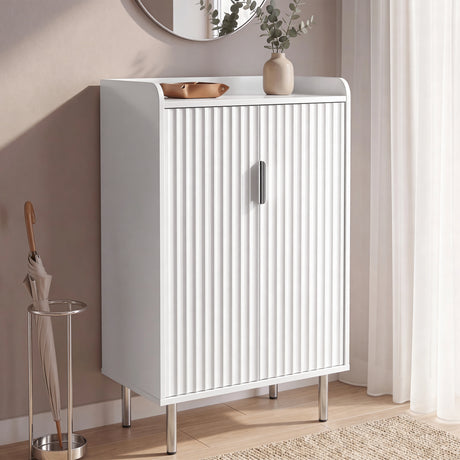 [White | 60cm] Flutrina shoe cabinet front angle in a hallway corner with an umbrella stand and a vase on the top shelf