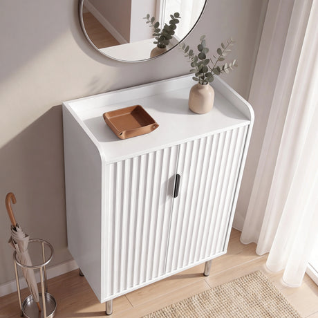 [White | 60cm] Flutrina shoe cabinet from a higher angle showing the guard panel top with a copper tray and vase on it