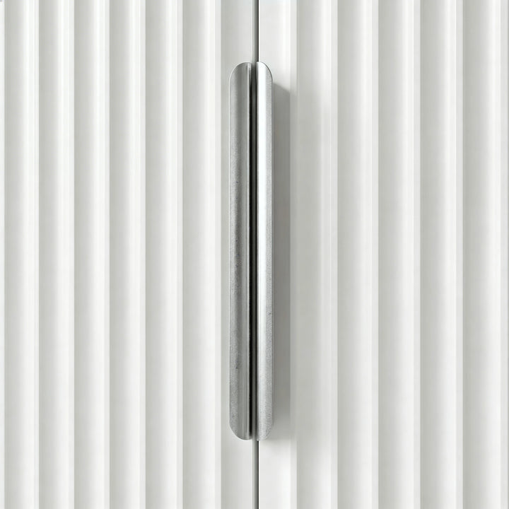 [White] Flutrina wardrobe close-up of brushed silver bar handle set against vertical ribbed fluted panelling