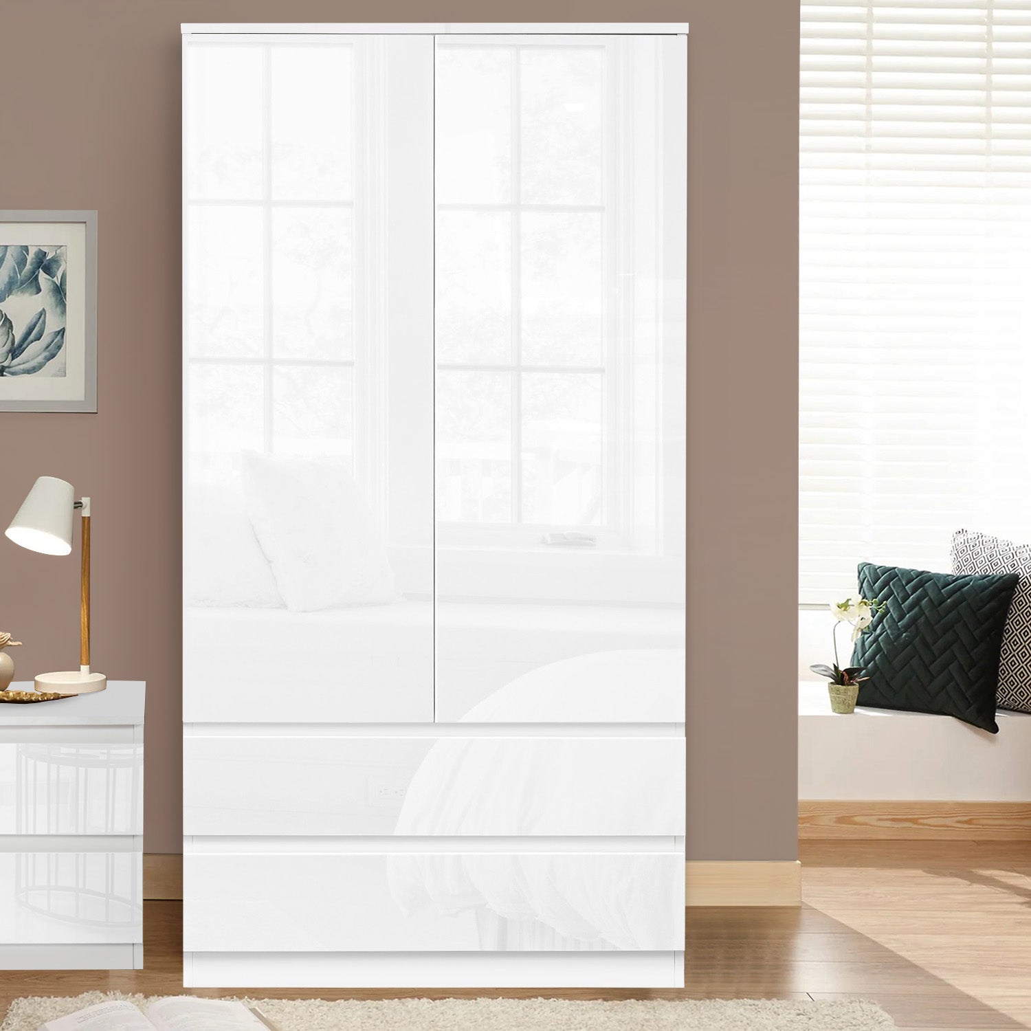 White furniture set for bedroom with wardrobe, drawers, and bedside table—elegance.