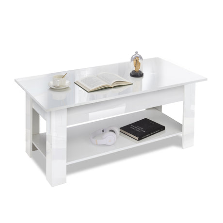 White modern coffee table with open shelf, headphones, book, cup, and decorative items on top