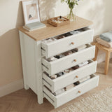 [White] Haven 4 drawer chest with all four drawers extended open, showing neatly organised accessories and clothing