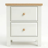 [White] nightstand with two drawers and a wooden top on a white background