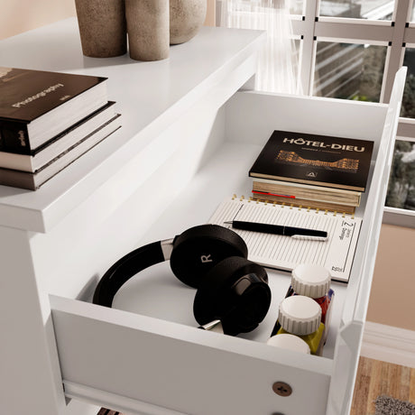 Close-up of open drawer in white high gloss chest with headphones, books, and accessories, part of the 3 Piece Bedroom Set.
