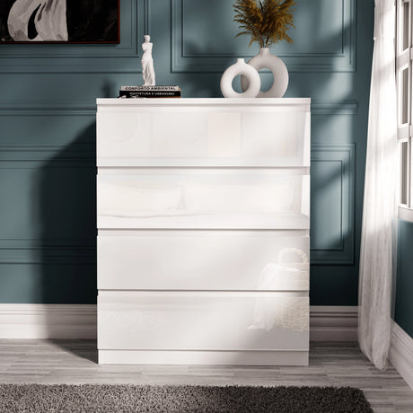 White high gloss 4 drawer chest from the 3 wardrobe bedroom set, perfect for organizing clothes in a contemporary bedroom.