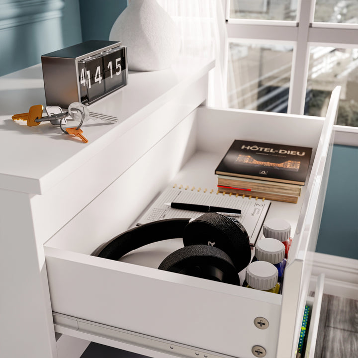 [White] Close-up of drawer in white high gloss bedside table from the bedroom set, storing headphones, books, and daily essentials.
