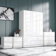[White] high gloss white 3 door wardrobe with white 3 drawer chest and pair of 2 drawer bedsides on a dark teal panelled wall