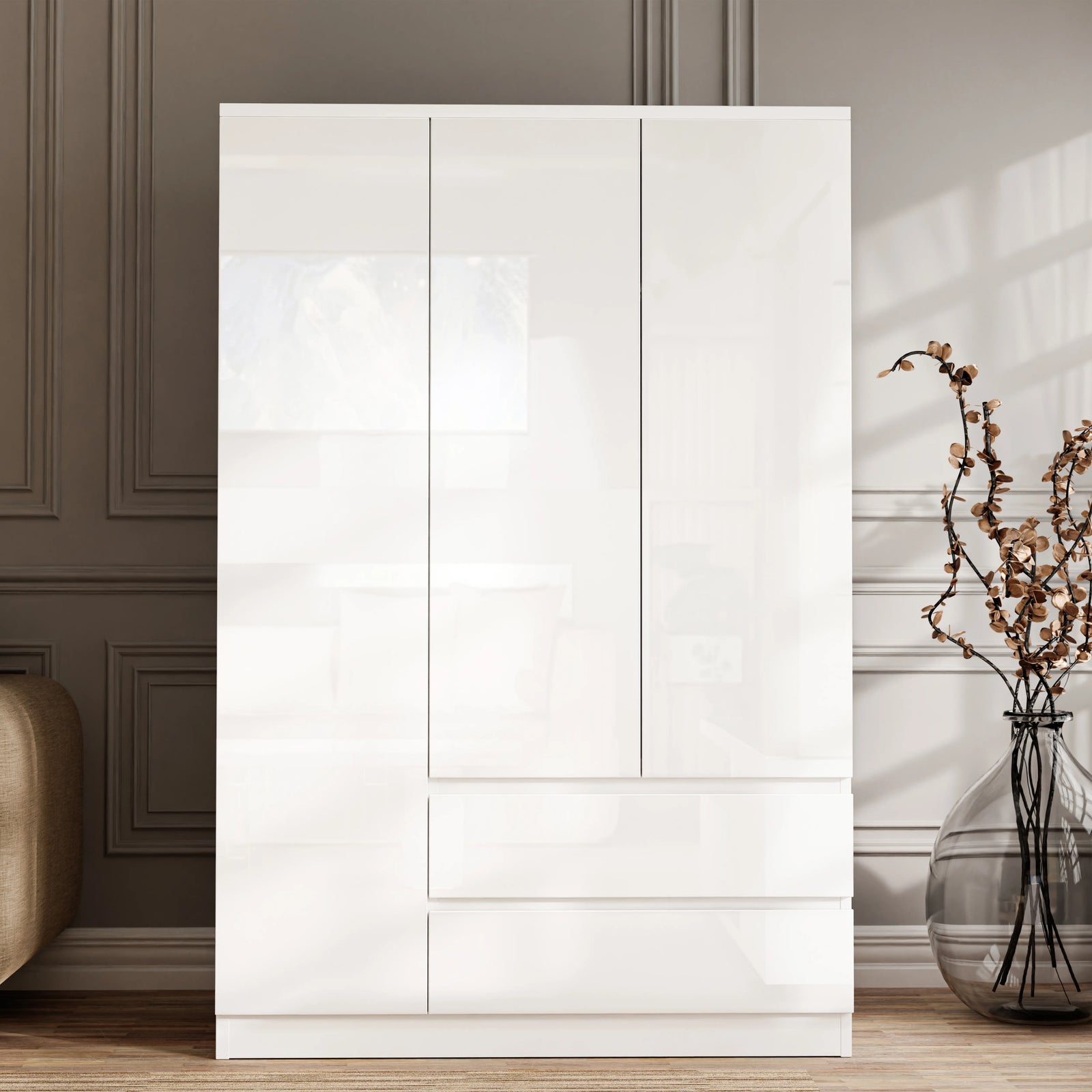 [White] high gloss white 3 door wardrobe with two lower drawers, glossy white fronts catching daylight from the right