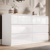 [White] High gloss 6 drawer chest of drawers in elegant bedroom with panelled wall and vases.