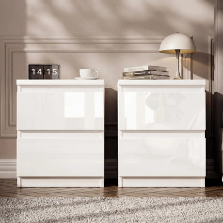 [White]  pair of high gloss bedside tables with handleless push-open drawers styled with clock and lamp