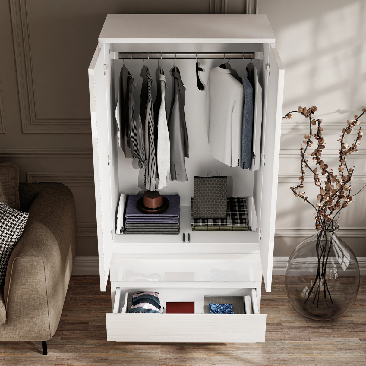[White] high angle shot of an open white high gloss wardrobe showing clothes on the hanging rail and folded in the bottom drawers