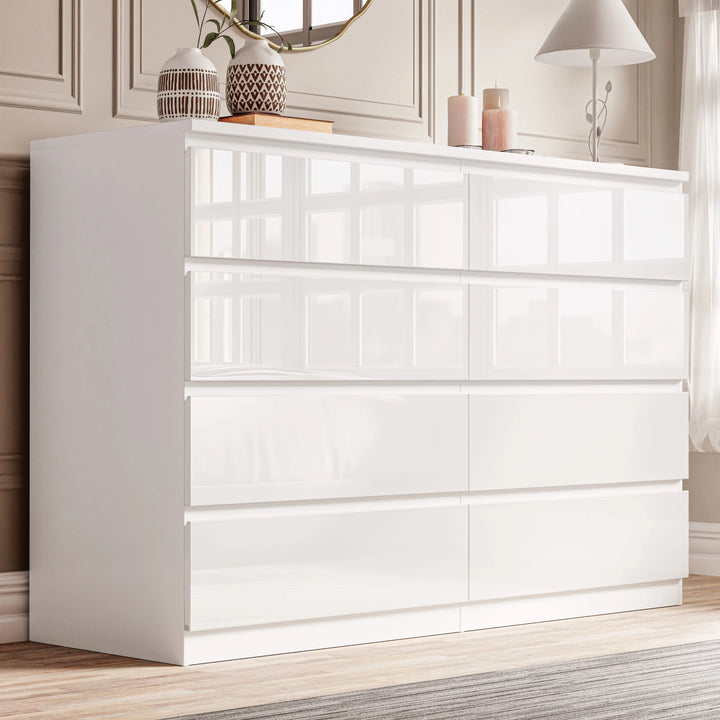 [White] high gloss wide chest of drawers styled in bedroom with arched mirror and decorative vases on top