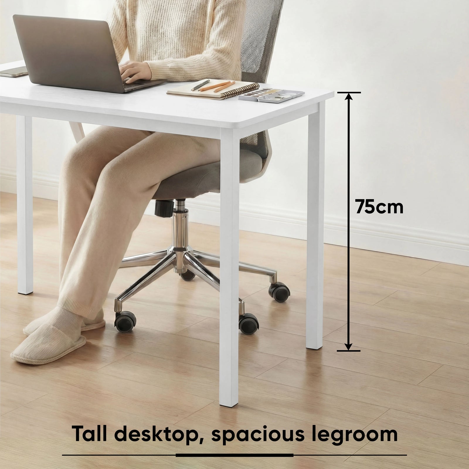 [120 x 50 cm] Home Office Desk shown with woman working on laptop, highlighting 75cm tall desktop height and spacious legroom for comfortable seating