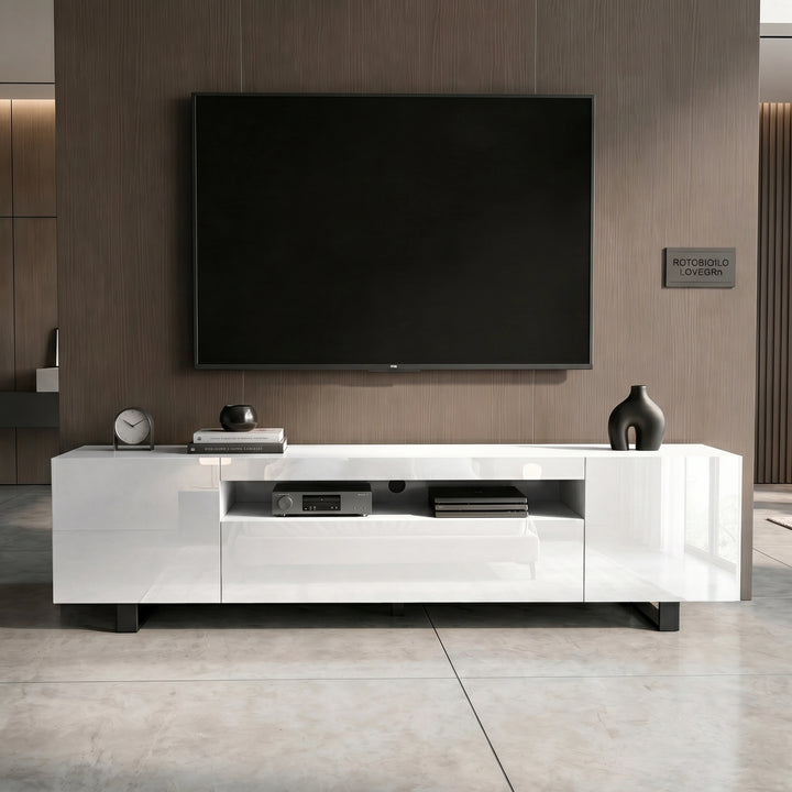 [White] Kystra TV unit facade view with handleless white doors, dark panel wall above and pale tile floor below