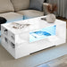 White coffee table with LED lighting in a living room setting