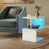 Modern living room with a green sofa and a side table with a glowing blue bottom shelf.