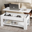 [White] Lift top coffee table raised with laptop showing hidden storage with headphones.