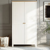 [White] Linra 2 Door Wardrobe front view in a grey panelled room with wicker basket to the left and olive tree branch to the right