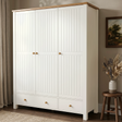 [White] 3 door wardrobe with wooden accents in a room setting