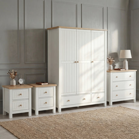 [White] Linra 4 piece white bedroom set showing 3-door wardrobe, chest of drawers and bedside table in room