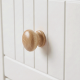 [White] Linra large 6 drawer chest macro of single oak knob against vertical-groove painted drawer panel