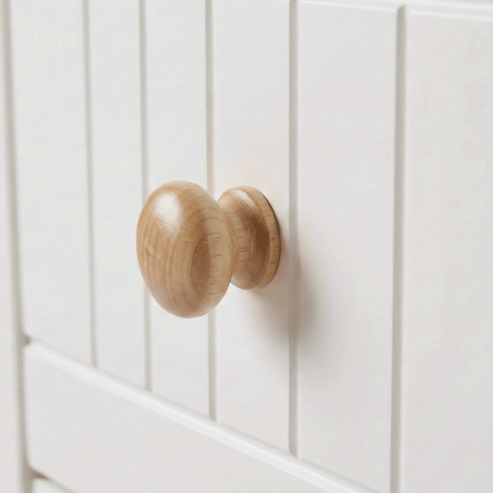 [White] Linra large 6 drawer chest macro of single oak knob against vertical-groove painted drawer panel
