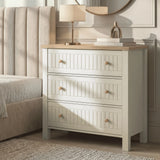 [White] Bedroom Linra chest of drawers in white with table lamp glowing and accessories on oak surface