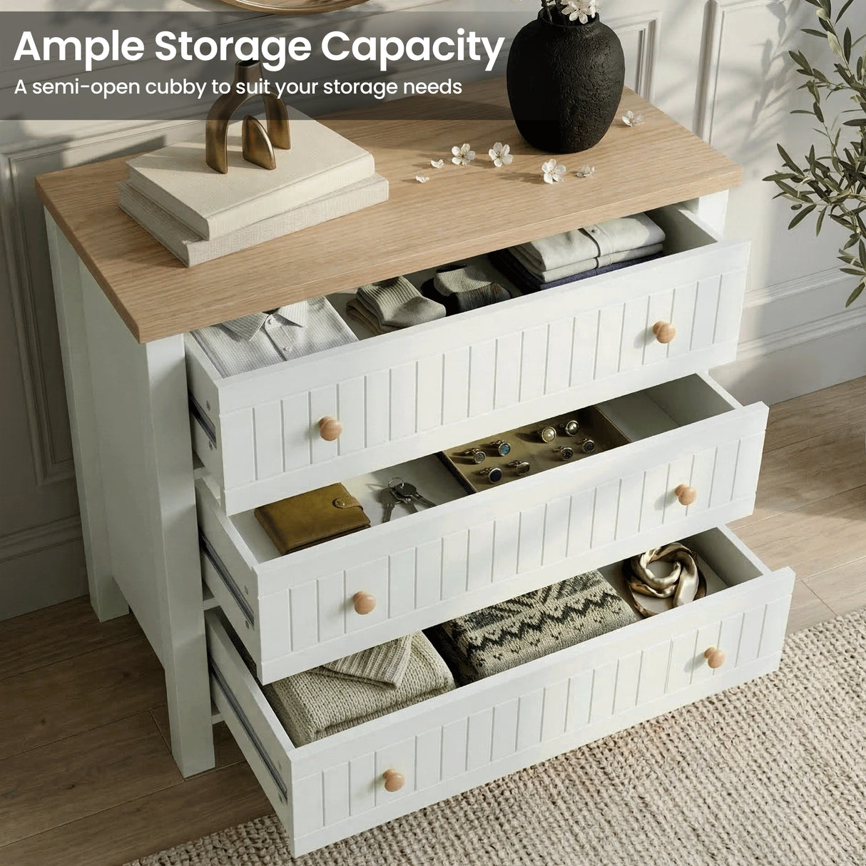 [White] Linra 3-drawer chest of drawers with drawers open highlighting ample storage capacity and oak top