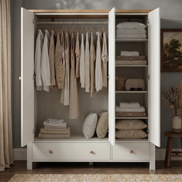 [White] Linra Painted 4 Piece Bedroom Furniture Set wardrobe open showing hanging rail with clothes, shelving with folded linens, and base drawers