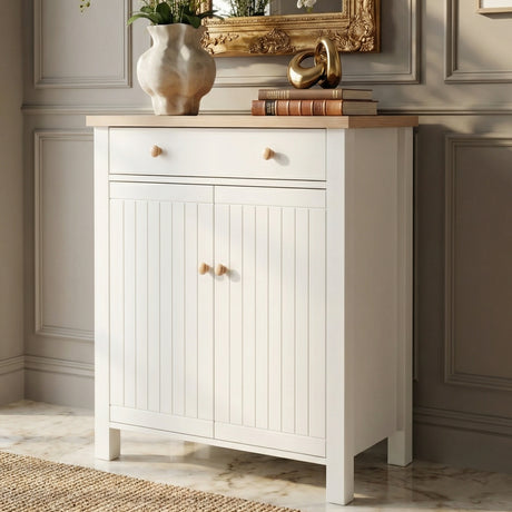 [White] Linra shoe cabinet front-facing with grooved double doors, oak knobs, top drawer, and natural oak top in a hallway