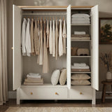[White] Linra wardrobe with doors open showing hanging rail, clothes, shelves, folded towels, pillows, and lower drawers.