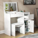 White vanity with mirror and open cabinet in a room setting