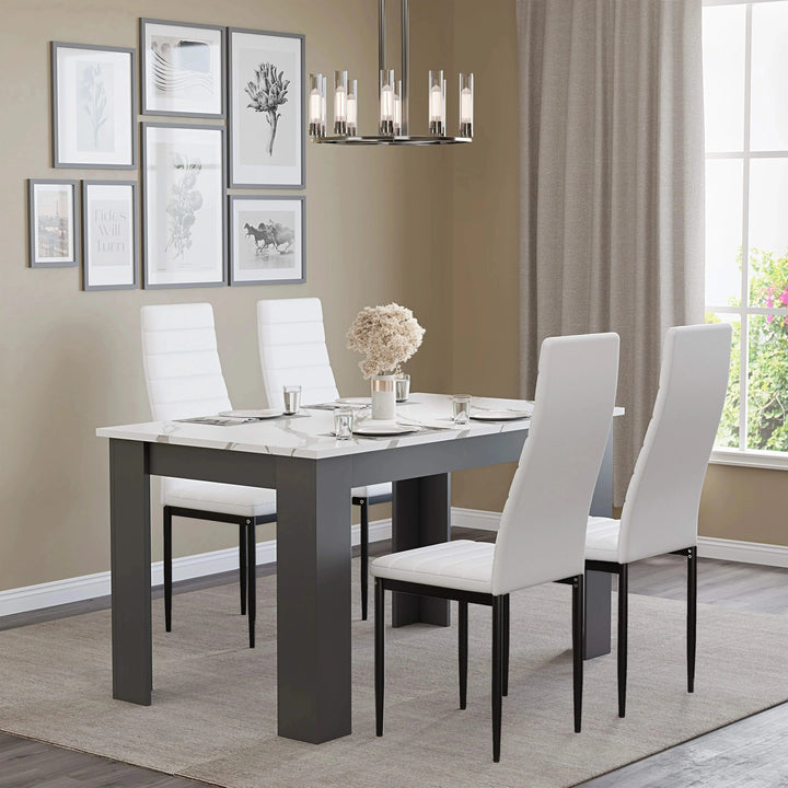 [4 Seater | White] white marble dining table with four white PU chairs under pendant lights, gallery wall
