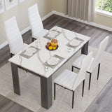 [4 Seater | White] overhead shot of marble dining table with four white chairs and central bowl of fruit