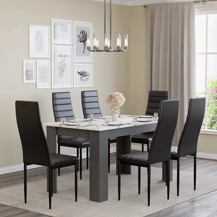 [6 Seater | Black] dining table and chairs set for six, black chairs around marble top, gallery wall behind