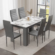 elegant marble dining table and 6 chairs set in grey and white with black leather chairs, modern vibe