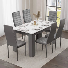 elegant marble dining table and 6 chairs set in grey and white with black leather chairs, modern vibe