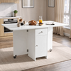 [White] Modern folding dining table fully open in a kitchen dinner and styled with a coffee carafe, juice and a newspaper.