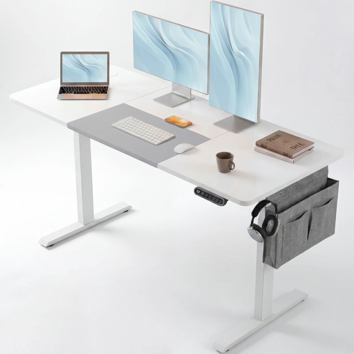 White Electric Standing Desk - Height Adjustable Office Desk with dual monitors, laptop, and accessories, ideal for ergonomic workspace setup.