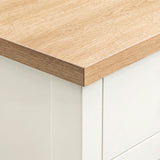 [White] Detail shot of the natural oak wood grain top edge on the White Shaker Bedside Table.