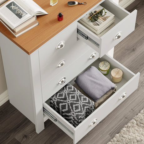 [White]  5 drawer chest open showing oak top surface with items and drawer depth