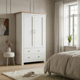 [White] Shaker wardrobe in bedroom with closed double doors, oak top, lower drawers, window, stool, bed, and slippers.