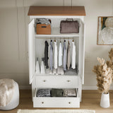 interior view of white shaker double wardrobe with drawers showing shelves, rail, and drawers from the high angle