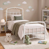[White | Single] Child bedroom scene showing curved rails, fairy lights, cloud wall art, teddy bear, toy dinosaur, and books.