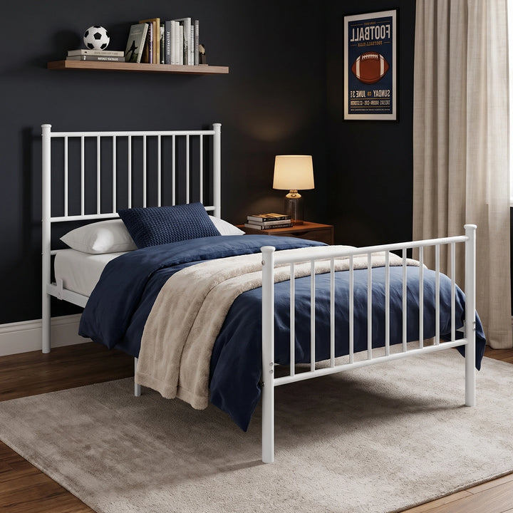[White | Single] Angled bedroom view showing metal bars, navy bedding, textured cushion, throw, lamp, and football art.