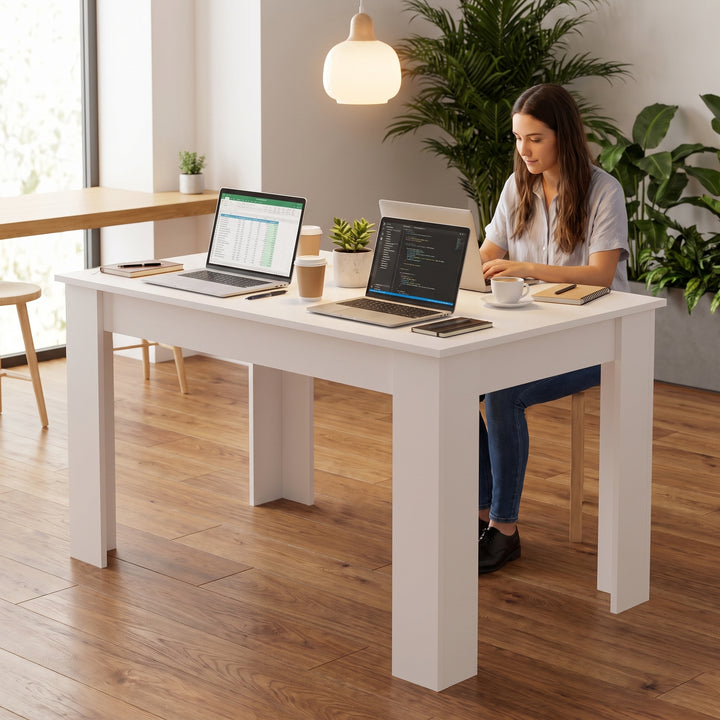 [140 cm | White] 6 Seater Dining Table Rectangle utilized as a spacious home office desk with multiple laptops.