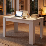 [140 cm | White] 6 Seater Dining Table Rectangle set up as a cozy study area at night with a laptop and books.