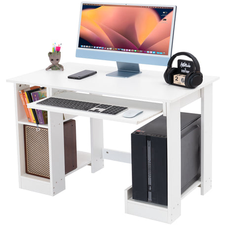 a small computer desk in white with a pull-out keyboard tray, monitor, and open shelves to keep your home workspace organized