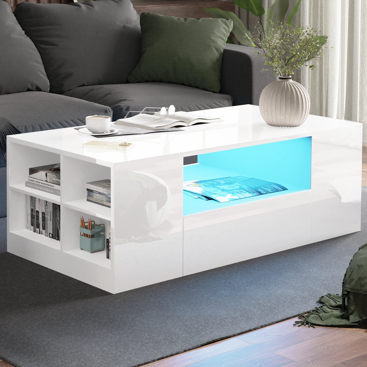 White coffee table with blue LED lighting in a living room setting